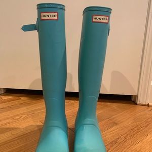 Tall blue hunter rain boots
